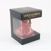 rood eendje van melkchocolade in verpakking